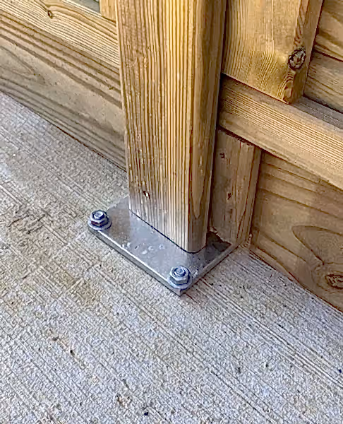 how to attach a fence to concrete