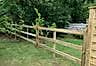 Post and rail morticed fencing in garden