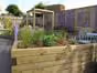 raised bed with landscape timber
