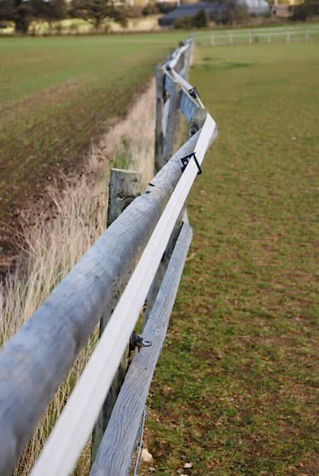 wavering fence caused by rot
