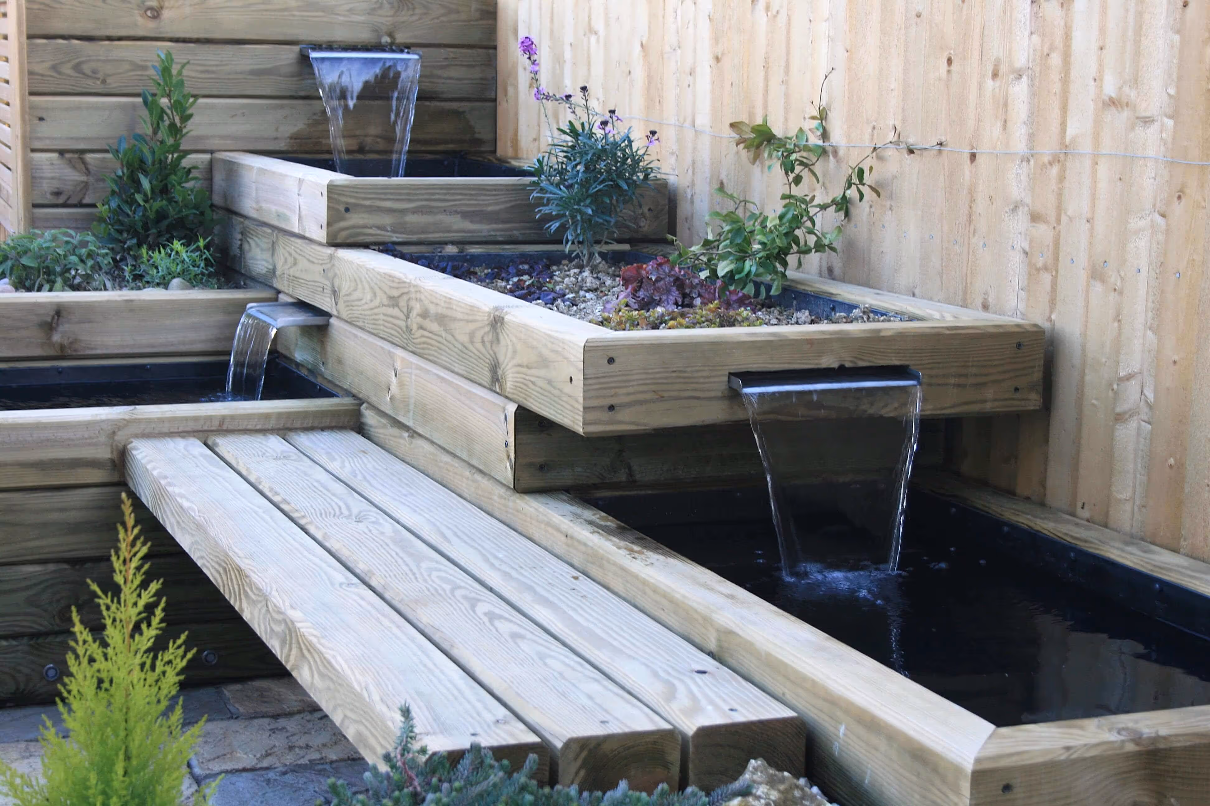 finished water feature using landscape timbers