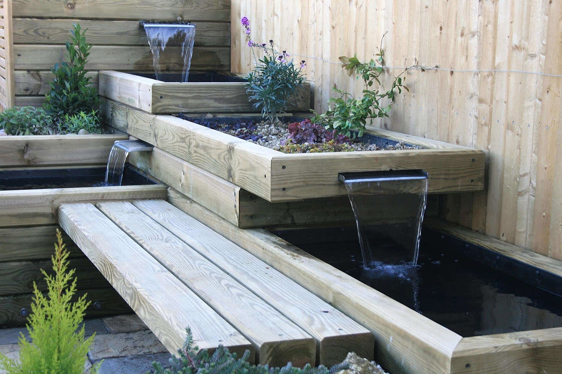 finished water feature using landscape timbers