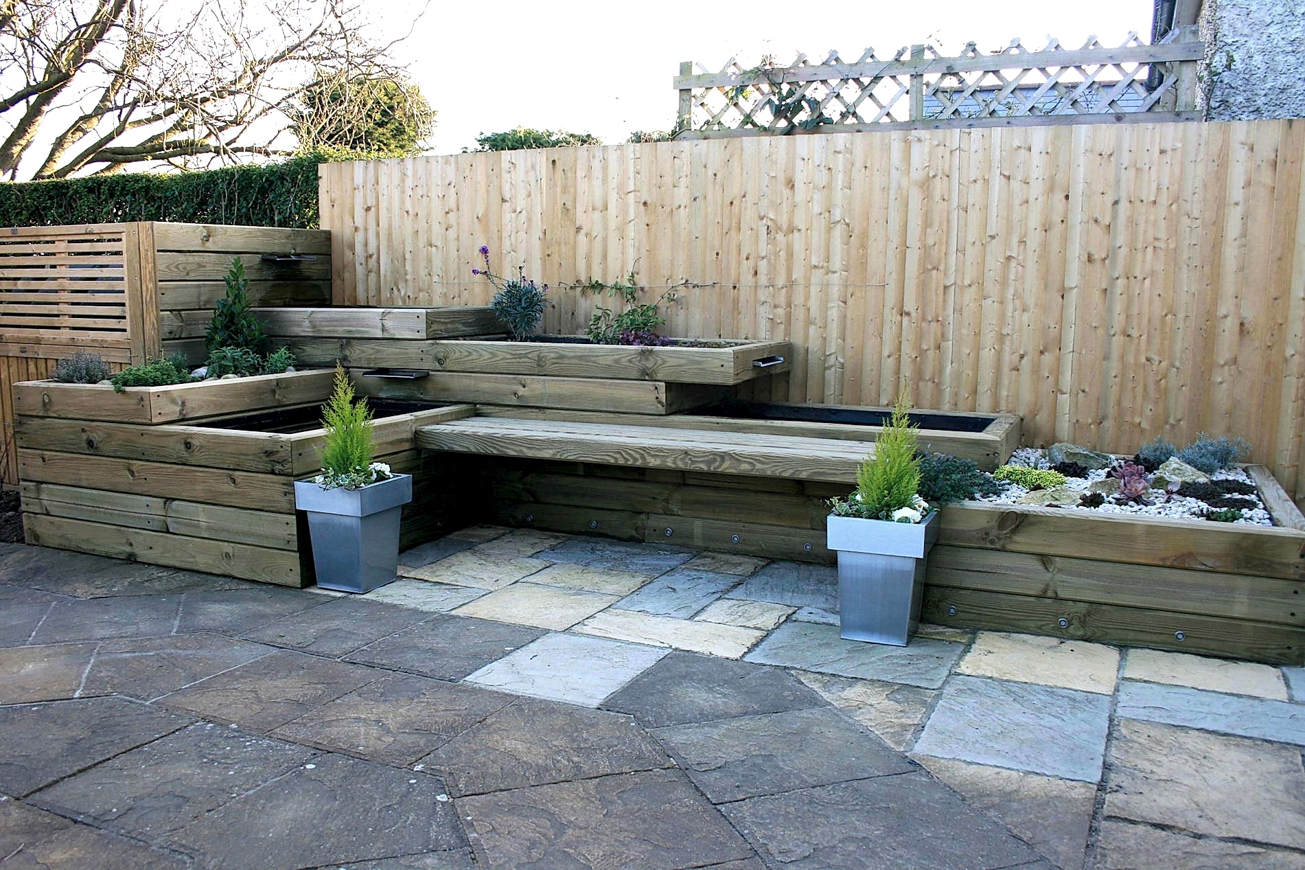 completed garden feature using landscape timbers