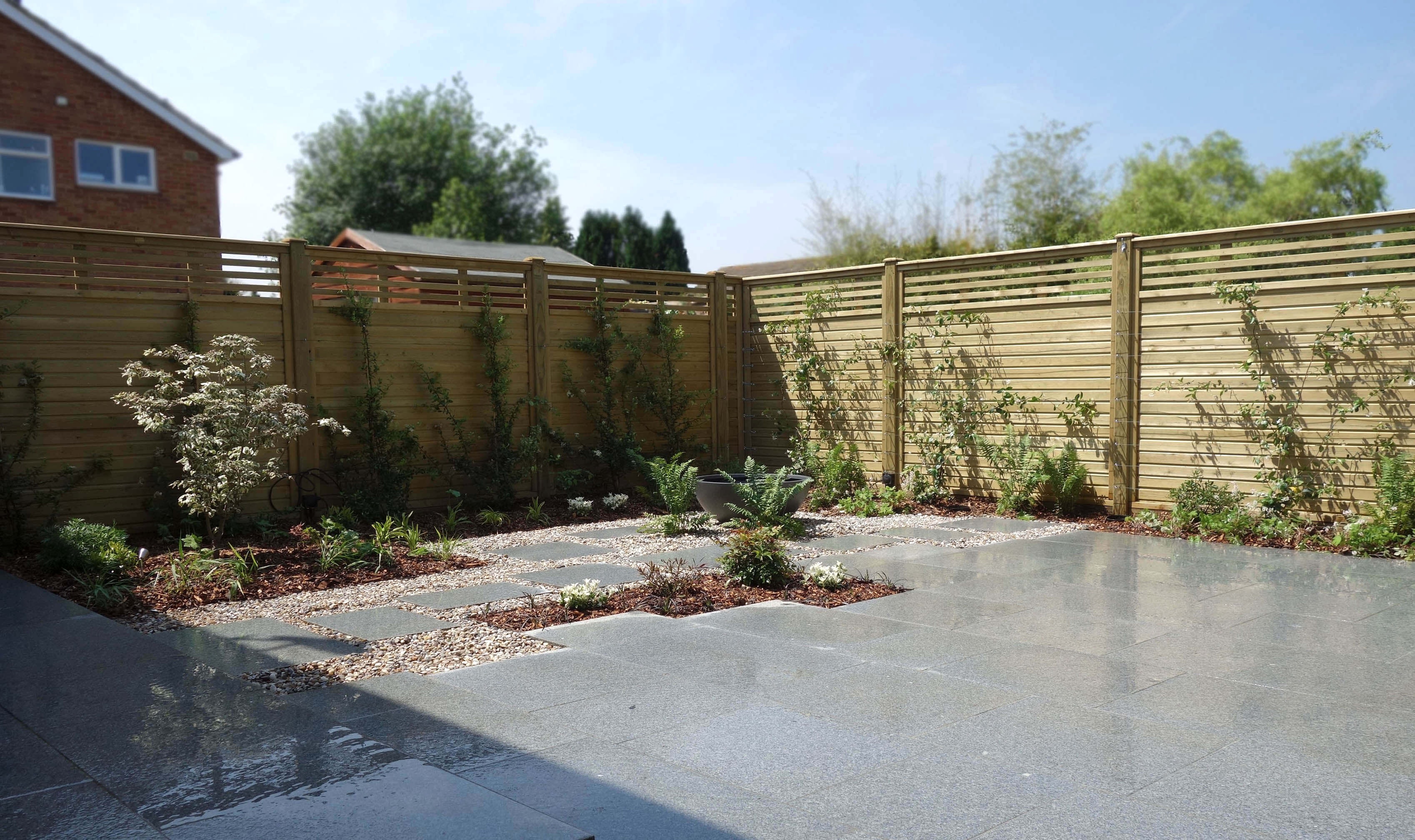 new wooden fence and garden design