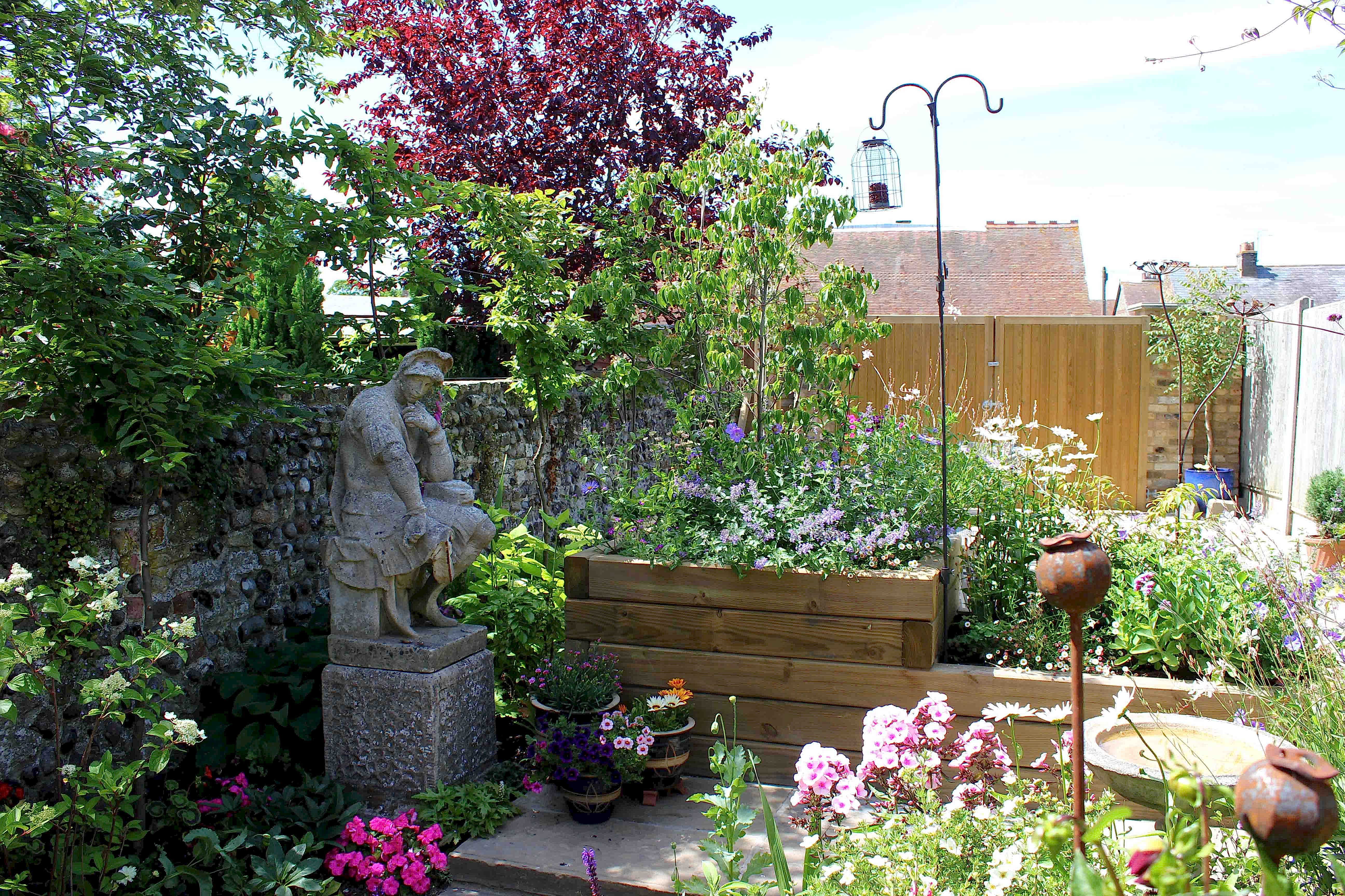 Timber sleepers raised beds and courtyard gates