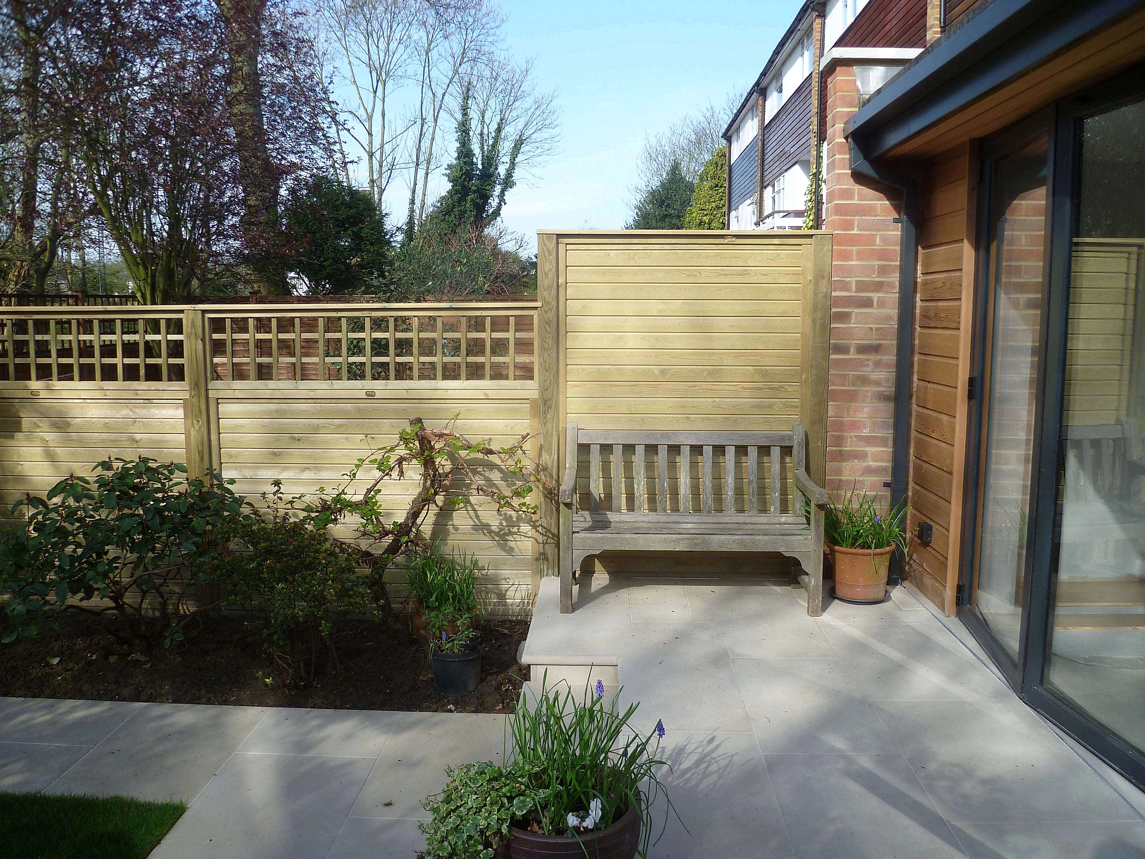 Privacy Fence panel on patio with trellis