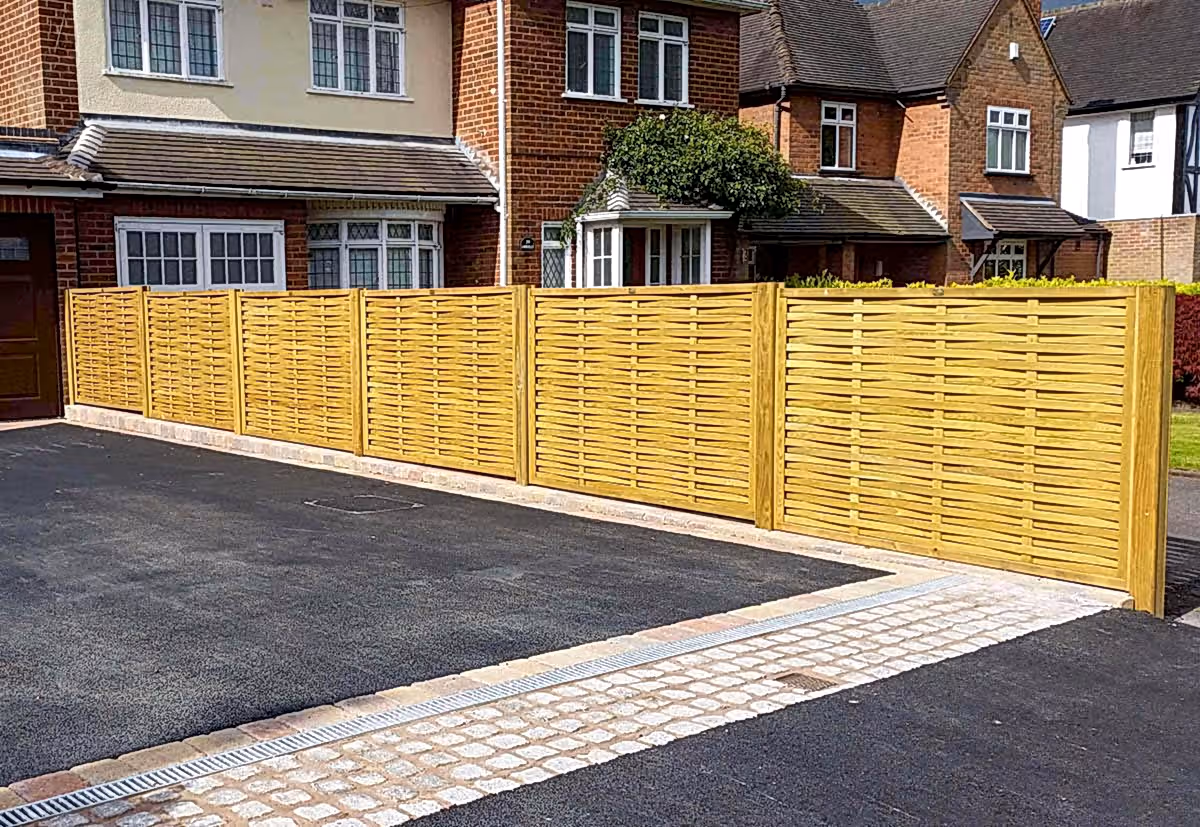 Driveway complete with woven fence panels