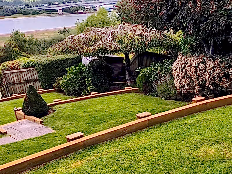 wooden treated sleepers as retaining walls