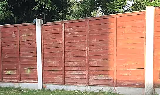 Fence panels in concrete posts