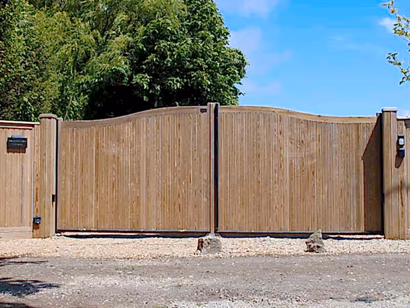 Hythe Courtyard Gates with timber cladding on posts