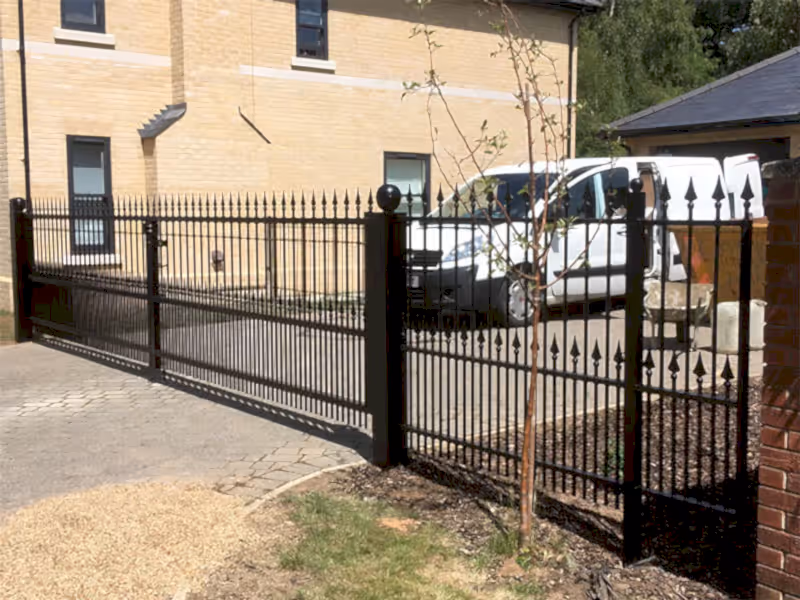 1.5m high black ornamental metal railings and gate