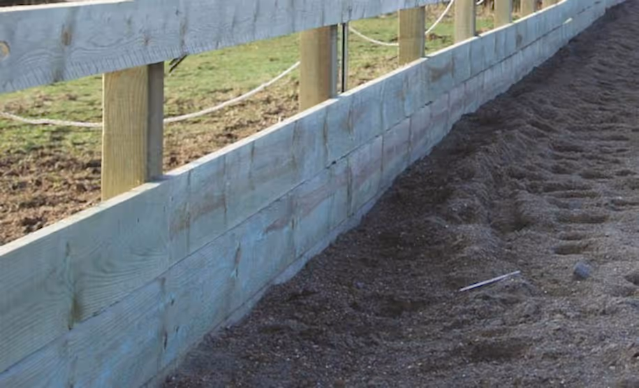 Riding arena containing board